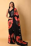 Buy_ISADAA BY ROTNA DUTT_Black Georgette Digital Printed Saree With Satin Border _at_Aza_Fashions