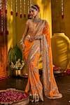 Buy_The Royaleum_Orange Silk Embroidery, Sequins, Zari, Mirrors V-neck Ishmira Saree _at_Aza_Fashions