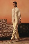 Buy_Pooja Rajgarhia Gupta_Beige Cotton Satin Embroidery Neerja Ikat Pattern Pant _at_Aza_Fashions