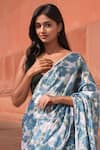 Shop_Naintara Bajaj_Sky Blue Chinon Pom-poms V-neck Floral Print Pre-draped Saree With Blouse _Online_at_Aza_Fashions