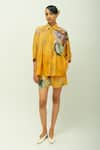 Buy_OFRIDA_Mustard Sol Dotted Dobby Printed Shorts _Online_at_Aza_Fashions