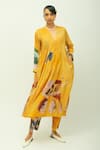 Buy_OFRIDA_Mustard V-neck Sol Dotted Dobby Abstract Print Dress _at_Aza_Fashions