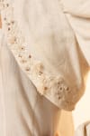 Shop OurDve Beige Handloom Cotton Embroidery, Beads, Tassels Summer Sway Cropped Jacket Online at Aza Fashions Shop_OurDve_Beige Handloom Cotton Embroidery, Beads, Tassels Summer Sway Cropped Jacket _Online_at_Aza_Fashions