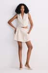 Buy_Reistor_Cream Cotton Notched Neck Tweed Cropped Vest And Pleated Skorts Set _at_Aza_Fashions