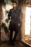 Buy_Varun Chakkilam_Black Polyester Beads, Sequins Cosmic Rays Embellished Sherwani And Pant Set _at_Aza_Fashions