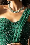 Quench A Thirst_Emerald Green Satin Stones, Pre-draped Saree And Embroidered Corset Blouse Set _at_Aza_Fashions