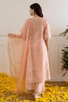 Shop ASRUMO Peach Chanderi, Organza Embroidery, Zari, Cut Work Split V-neck Kurta Set at Aza Fashions Shop_ASRUMO_Peach Chanderi, Organza Embroidery, Zari, Cut Work Split V-neck Kurta Set _at_Aza_Fashions
