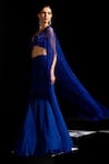 Vesture Blue Mesh, Crepe Beads, Tassels, Sapphire Fishcut Skirt Set With Cape Online at Aza Fashions Vesture_Blue Mesh, Crepe Beads, Tassels, Sapphire Fishcut Skirt Set With Cape _Online_at_Aza_Fashions