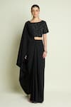 Buy Aakaar Black Crepe Beads, Sequins Boat Neck Embellished Blouse With Pre-draped Saree Online at Aza Fashions Buy_Aakaar_Black Crepe Beads, Sequins Boat Neck Embellished Blouse With Pre-draped Saree _Online_at_Aza_Fashions