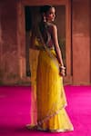 Shop_Angad Singh_Yellow Net Mirrors, Zari V-neck Saree With Blouse _at_Aza_Fashions