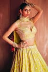 Angad Singh_Yellow Silk Mirrors, Embroidery Sweetheart Neck Raw Lehenga Set _Online_at_Aza_Fashions