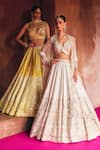 Angad Singh_Yellow Silk Mirrors, Embroidery Sweetheart Neck Raw Lehenga Set _at_Aza_Fashions