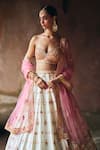 Angad Singh_Ivory Silk, Net Mirrors, Zari, Embroidery Sweetheart Raw Bridal Lehenga Set _Online_at_Aza_Fashions
