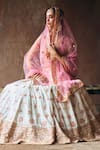Shop_Angad Singh_Ivory Silk, Net Mirrors, Zari, Embroidery Sweetheart Raw Bridal Lehenga Set _Online_at_Aza_Fashions