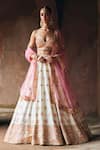 Buy_Angad Singh_Ivory Silk, Net Mirrors, Zari, Embroidery Sweetheart Raw Bridal Lehenga Set _at_Aza_Fashions