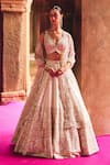 Buy_Angad Singh_Ivory Silk, Net Mirrors, Zari, Gota Patti, Embroidery Raw Bridal Lehenga Set _at_Aza_Fashions