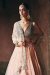 Angad Singh_Peach Tissue, Net Mirrors, Embroidery V-neck Lehenga Set _at_Aza_Fashions