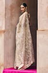 Angad Singh_Rose Gold Net Embroidery, Mirrors, Sequins, Crystals V-neck Saree With Blouse _at_Aza_Fashions