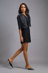 Deepika Arora_Black Roma Embroidery V-neck Textured Puff Sleeve Playsuit _at_Aza_Fashions