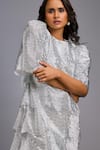 Deepika Arora_Silver Roma Sequins Round Neck Shimmer Textured Knee-length Dress _at_Aza_Fashions