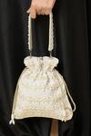 The Purple Sack_Off White Beads, Pearls Beaded And Embroidered Potli Bag _at_Aza_Fashions