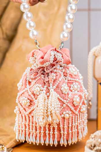 Buy_NR By Nidhi Rathi_Peach Pearls, Beads, Tassels Embellished Drawstring Potli Bag _at_Aza_Fashions