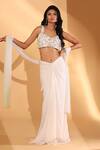 Buy_Kiyohra_Ivory Georgette, Net Embroidery, Beads, Crystals, Tassels Ziva Draped Skirt Set _Online_at_Aza_Fashions