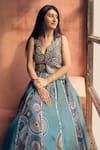 Label Moni K_Teal Crepe, Tissue Embroidery, Beads, Chakra Scallop Waistcoat With Lehenga _at_Aza_Fashions