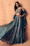 Buy_Label Moni K_Teal Tissue, Crepe, Organza Embroidery, Zari, Chakra Scallop Lehenga Set 