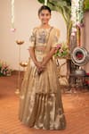 Shop_Panchhi By Kanupriya Tibrewala_Gold Silk Stones, Pearls, Embroidery, Gemstones, Gota Gaja Lakshmi Lehenga Set _at_Aza_Fashions