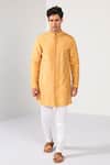 Kalpana Naik_Mustard Bemberg, Silk Pintuck Sunshine Kurta Set _Online_at_Aza_Fashions
