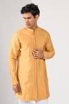 Buy_Kalpana Naik_Mustard Bemberg, Silk Pintuck Sunshine Kurta Set _Online_at_Aza_Fashions