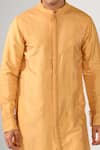 Shop_Kalpana Naik_Mustard Bemberg, Silk Pintuck Sunshine Kurta Set _Online_at_Aza_Fashions