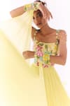 Show Shaa_Yellow Chiffon, Net Embroidery, Sequins, Floral Corset And Pleated Skirt Set _Online_at_Aza_Fashions