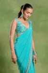 Shop_Tuhina Srivastava_Blue Crepe, Silk Embroidery, Sequins V-neck Border Saree And Blouse Set _at_Aza_Fashions