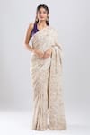 Azeera_Ivory Tissue Embroidery, Sequins, Zari Saree With Unstitched Blouse Piece _Online_at_Aza_Fashions