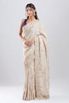 Buy_Azeera_Ivory Tissue Embroidery, Sequins, Zari Saree With Unstitched Blouse Piece _Online_at_Aza_Fashions