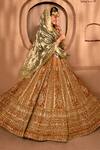 Shop_Amaltas Couture_Orange Tissue Embroidery, Sequins, Stones, Zari V-neck Rust Bridal Lehenga Set _at_Aza_Fashions
