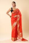 Buy_Mint N Oranges_Orange Organza Zari Floral Woven Saree With Unstitched Blouse Piece _at_Aza_Fashions