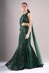 Samyukta Singhania_Emerald Green Net, Lycra Sequins, Embroidery Round Neck Wavy Hand Lehenga Set _at_Aza_Fashions