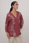 Buy_RANNA GILL_Rust Crinkle Embroidery V-neck Amber Top_at_Aza_Fashions
