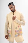Kalpana Naik_Beige Bemberg, Silk Embroidery Minimal Bloom Nehru Jacket And Kurta Set _at_Aza_Fashions