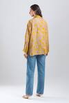 Shop_Divyam Mehta_Yellow Collared Bloom Placement Print Shirt _at_Aza_Fashions