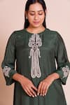 Brij_Green Muslin, Silk Embroidery, Tassels Round Neck Firan Bottle Kurta Set _at_Aza_Fashions