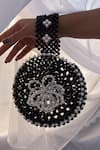 Rubilon_Black Beads, Pearls Bloom Beaded Circular Wristlet With Flower _Online_at_Aza_Fashions