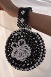 Buy_Rubilon_Black Beads, Pearls Bloom Beaded Circular Wristlet With Flower _at_Aza_Fashions