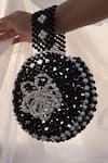 Shop_Rubilon_Black Beads, Pearls Bloom Beaded Circular Wristlet With Flower _at_Aza_Fashions