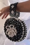Buy_Rubilon_Black Beads, Pearls Bloom Beaded Circular Wristlet With Flower _Online_at_Aza_Fashions