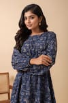 Naintara Bajaj_Blue Crepe Round Neck Abstract Print Backless Dress _at_Aza_Fashions