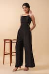 Naintara Bajaj_Black Crepe Square Neck Strappy Jumpsuit _Online_at_Aza_Fashions